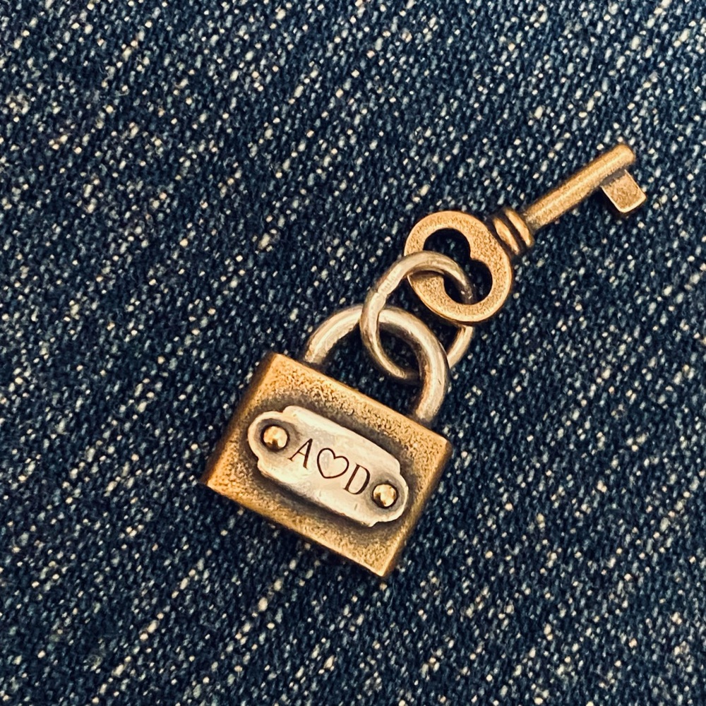 James Avery retired love Lock and Key Charm
Bronze & silver with initials A&D